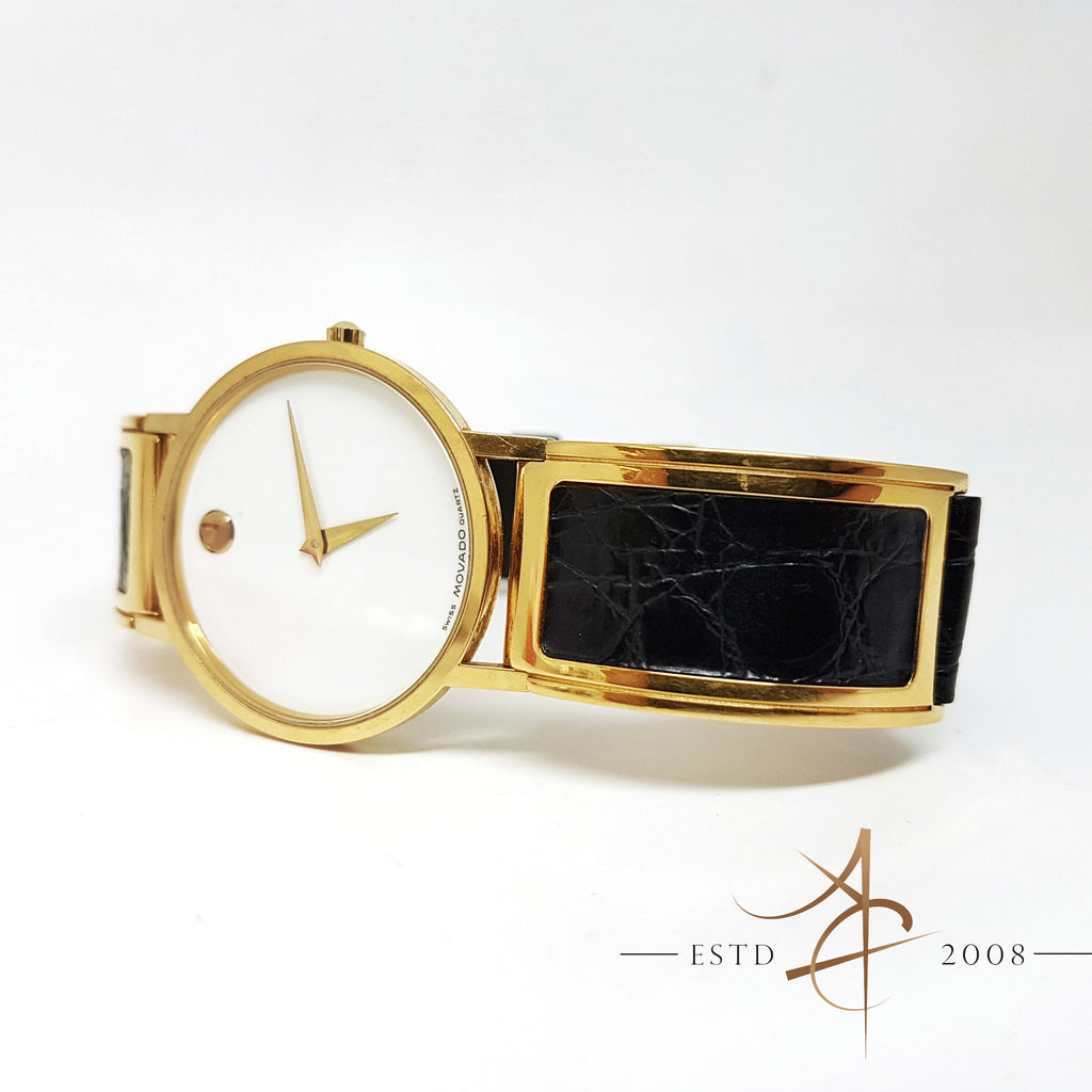 Gold movado hot sale museum watch