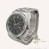 Rolex Oyster Date 15210 Black Dial Engine Turned Bezel (1999)